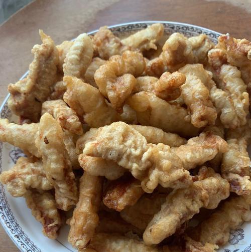 油炸酥肉的制作方法（如何制作香脆可口的油炸酥肉）