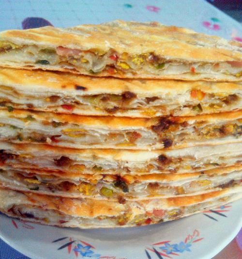 油渣饼的制作方法（健康美食享受无负担——以饱满口感）  第1张