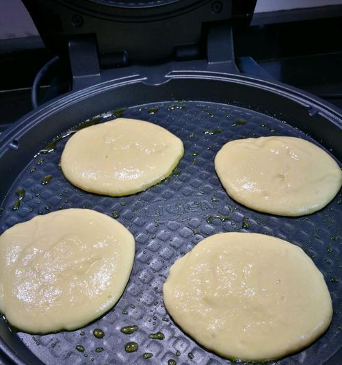 新鲜玉米饼的制作方法（让你在家也能尝到地道的玉米饼）  第1张