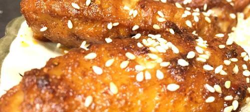 蒜蓉蜂蜜鸡翅的制作方法（做出美味诱人的鸡翅）  第1张