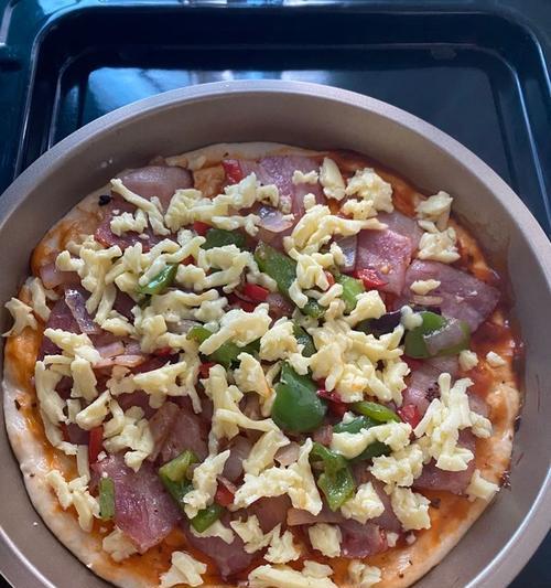 用烤箱轻松制作美味以什锦土豆披萨（简单步骤教你制作美味土豆披萨）  第2张
