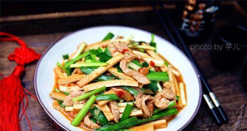清炒豆腐的制作方法（简单易学的豆腐烹饪技巧）  第3张