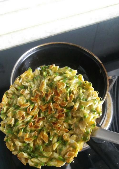 青萝卜丝鸡蛋饼的制作方法（健康美味的营养早餐）  第3张