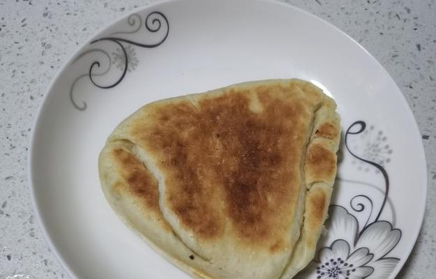 自制烧饼的完美做法（享受美味的烧饼油条早餐，让你的味蕾尽情颤动）  第3张