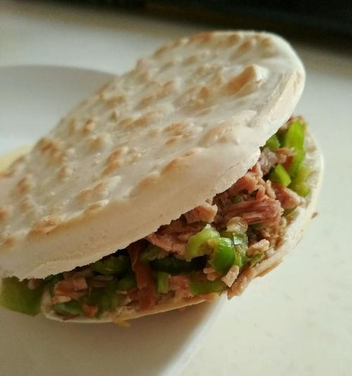 孜然炒肉夹馍怎么做？步骤和技巧是什么？