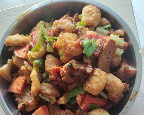 油豆腐炒肉片的做法是什么？如何让肉片更嫩滑？