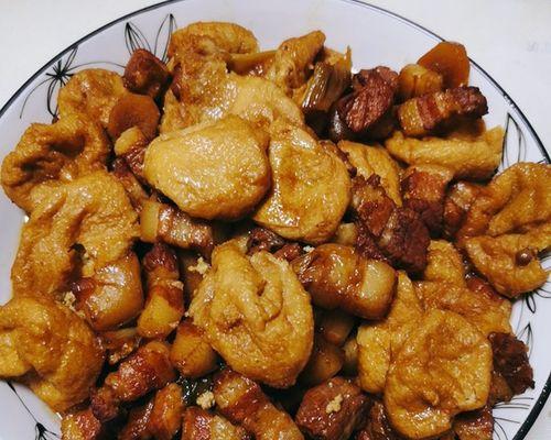 油豆腐包肉的做法是什么？如何做出鲜嫩多汁的油豆腐包肉？