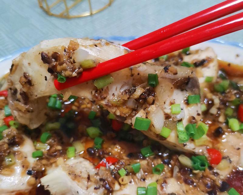 香豉蒸罗非鱼怎么做？步骤和技巧是什么？