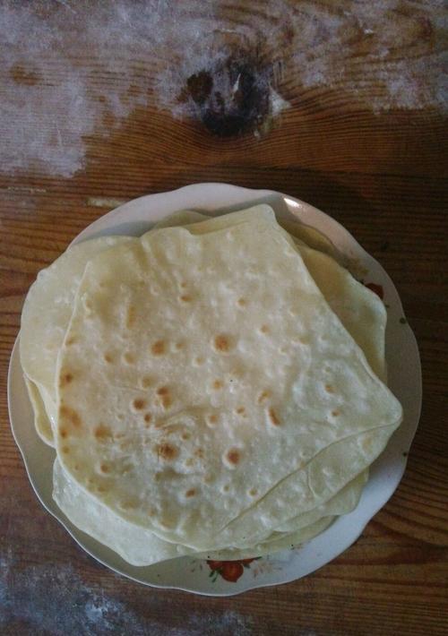 奥尔良卷饼的制作方法（美味可口的家常早餐菜谱）